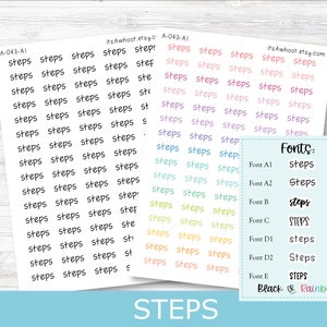 May include: A sheet of colorful stickers with the word "STEPS" written in different fonts and colors. The stickers are arranged in rows and columns. The sheet is on a light wood background. The text "Fonts:" is written in black at the top of the sheet, followed by a list of fonts and their corresponding names.