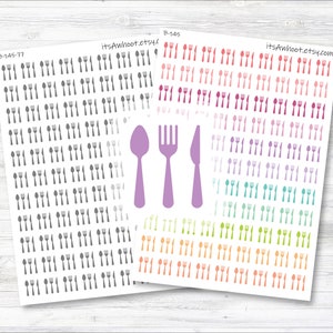 May include: Two sheets of sticker paper with various coloured cutlery designs. The left sheet has grey cutlery designs. The right sheet has colourful cutlery designs in a rainbow gradient. The right sheet also has a purple spoon, fork, and knife.