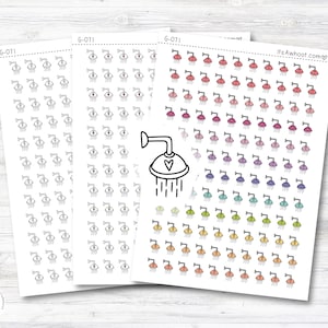 May include: Three sheets of stickers featuring a shower head design. The stickers are black and white with a heart in the shower head. The stickers are arranged in rows and columns. The sheets are labeled "6-071".