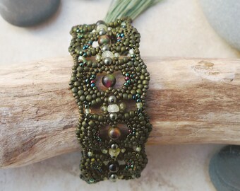 Bracelet with Tiger Eye, Green Garnet and Peridot Gemstones are woven with Miyuki Beads and Crystal Pearls, Magnetic Clasp, Silk Tassel
