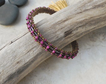 Bracelet: Faceted Natural Rubies are hand woven with Japanese Miyuki Beads in Gold and Plum / Vintage Styling with Silk Tassel / Art Deco
