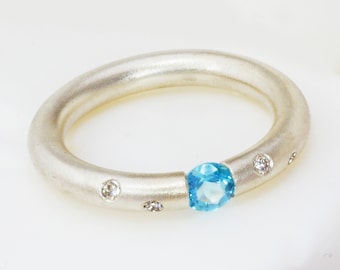 Silver Topaz and Diamond Tension Ring