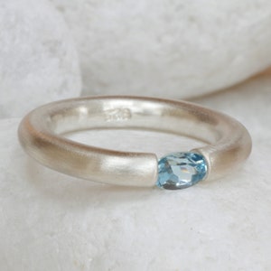 gemstone tension ring in silver