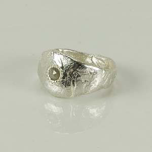 A Sterling Silver Freeform Sculpted Ring With A Grey Rose cut Diamond