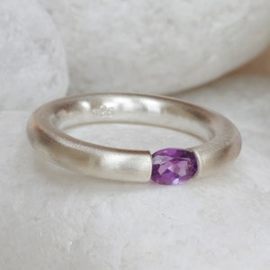 Tension ring in brushed silver