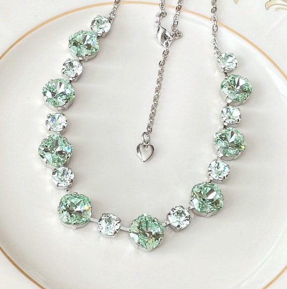 Flower Necklace with Swarovksi (R) Crystals Set in Sterling Silver Light Green Flower Necklace with Swarovksi (R) Crystals Set in Sterling Silver Light Green