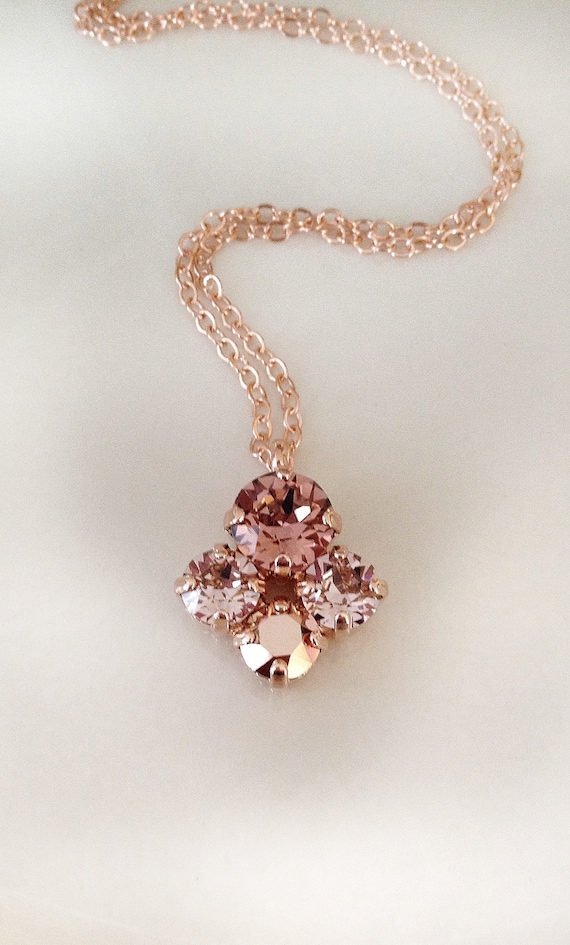 Rose gold necklace with pink stone deals