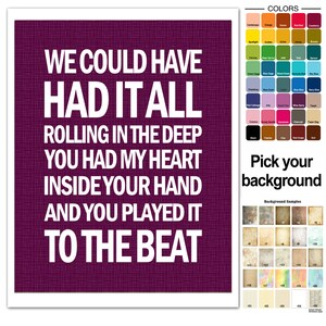 May include: A printable digital download featuring the lyrics "We could have had it all, rolling in the deep, you had my heart inside your hand, and you played it to the beat" in white text on a dark purple background.