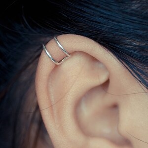 Dubbele band kraakbeen oor manchet sterling zilver