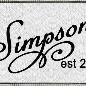 May include: Black and white mosaic tile with the text "Simpson est 2021" in a cursive font.