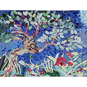 May include: A mosaic artwork depicting an owl perched in a tree under a full moon. The artwork features a blue background with a tree, owl, and cat, all created with colorful mosaic tiles. The owl has brown and black feathers.