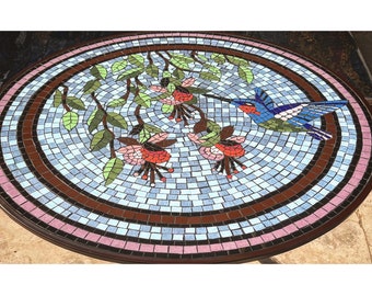 Humming bird mosaic medallion for install made with hand cut tile on mesh mosaic art install