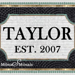 May include: A mosaic tile sign with the name "TAYLOR" in bold black letters, with "EST. 2007" below. The sign has a white background, black and gold accents, and a green border. The artist's name is at the bottom.
