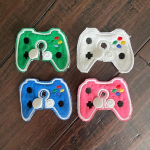 Video game controller gtube pad feeding tube bellybutton button hug