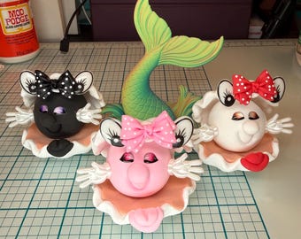 Pearl sisters with mermaid tail