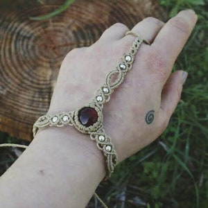 Macrame slave bracelet in beige with red glass cabochon