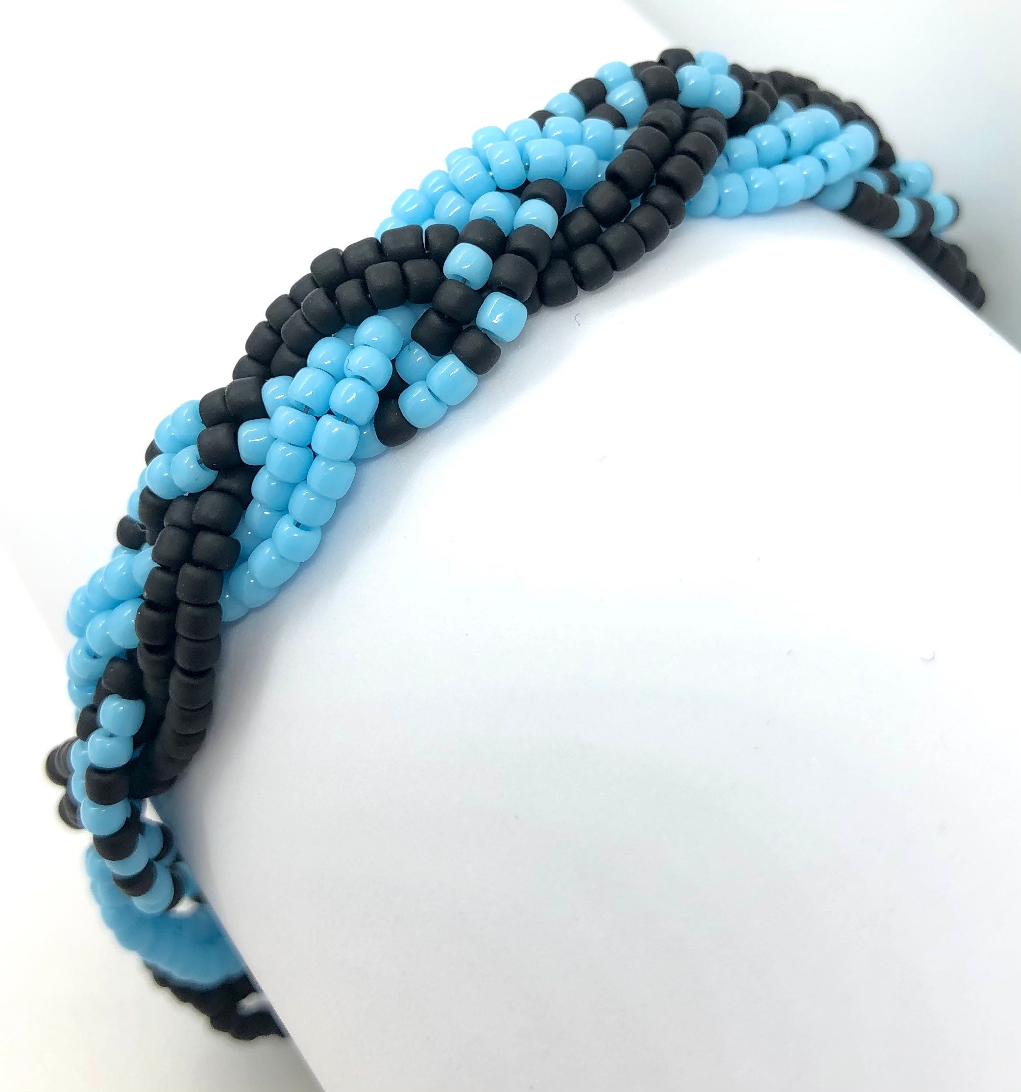 Image of Braid with pastel beads pastel goth hairstyle
