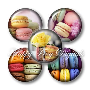 May include: Five round, colorful, decorative, glass cabochons with images of macarons. The cabochons are arranged in a circle. The macarons are in various colors, including pink, yellow, green, blue, and orange.