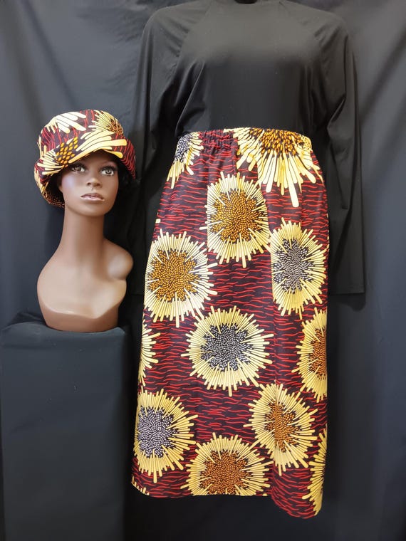2pc Africa Print Skirt and matching bucket hat. Straight ankle length, elastic waist skirt with pockets. PLUS Size. Free Shipping, 20 % OFF.