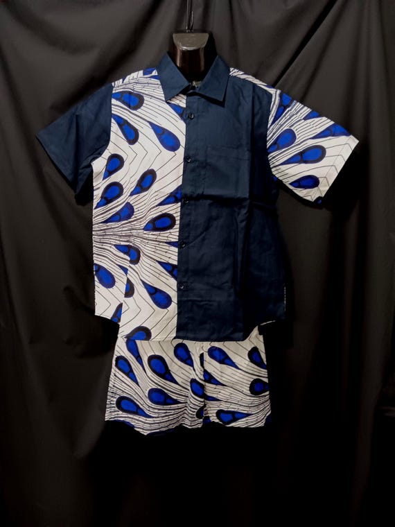 Africa inspired Men's shorts set 2pc. Short sleeve shirt has Button down front, chest pocket. Size L, XL, 2XL, 3XL. 20% off. Free Shipping.