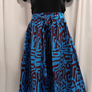 African women's Palazzo Pants. Royal blue, and plum purple African print with, tie waist belt, pockets and headwrap. image 2