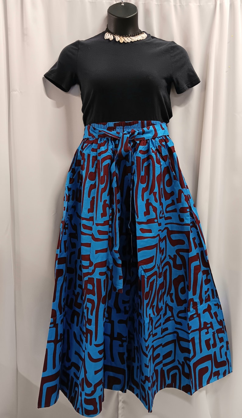 African women's Palazzo Pants. Royal blue, and plum purple African print with, tie waist belt, pockets and headwrap. image 2