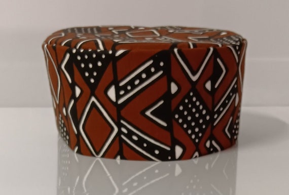 Africa print kufi hat, colors brown, black and white beautiful African Fabric. Matching dashiki sold separately.
