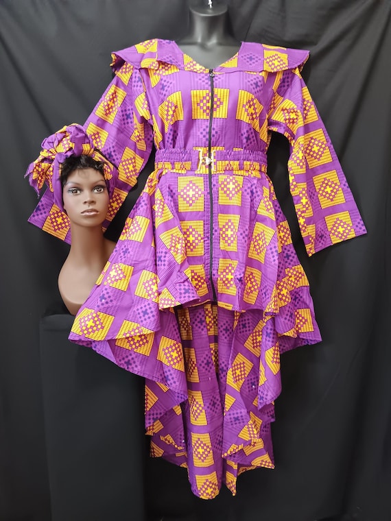 Africa inspired dress. High-low dress with matching Headwrap and cinch belt. Zipper front, long sleeves, pockets. 20% off and Free Shipping.