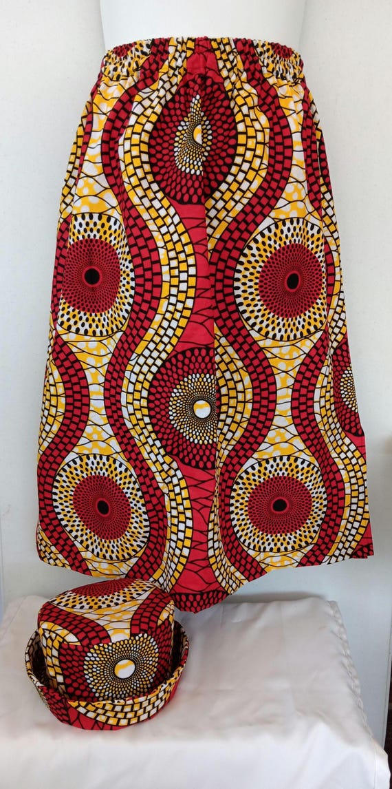 2pc Africa Print Skirt and matching bucket hat. Straight ankle length, and elastic waist skirt with pockets. Free Shipping, 20 % OFF.
