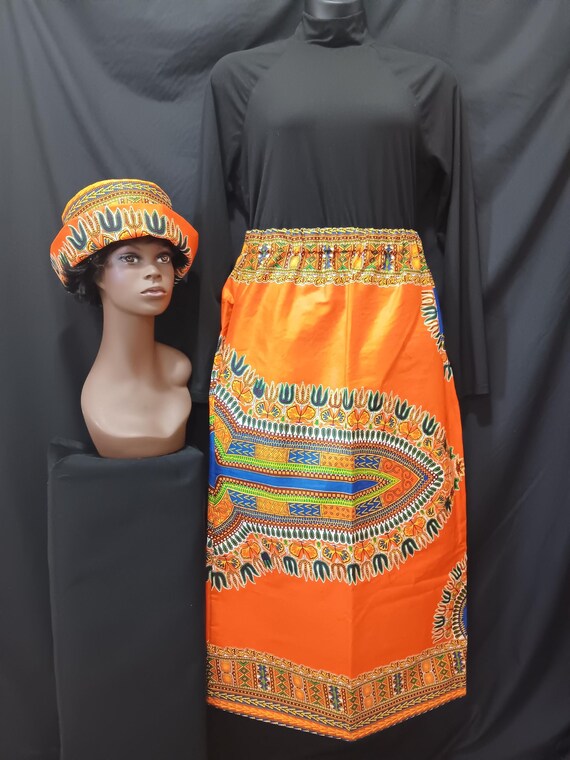 2pc Africa Print Skirt and matching bucket hat. Straight ankle length, elastic waist skirt with pockets. Free Shipping, 20 % OFF.