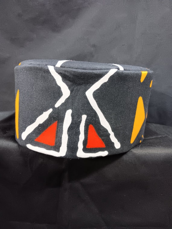 African inspired kufi hat Motherland print, beautiful colors, black, gold, red, and white.