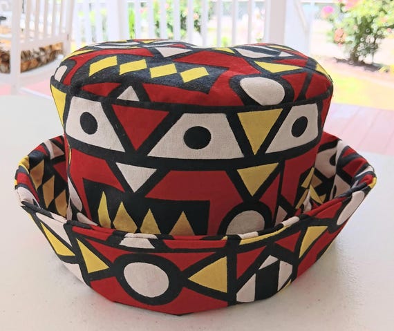 Africa inspired fabric Bucket hat, cotton fabric fully lined. Unisex. Colors are red, yellow, black, white fabric. 20%OFF and FREE Shipping