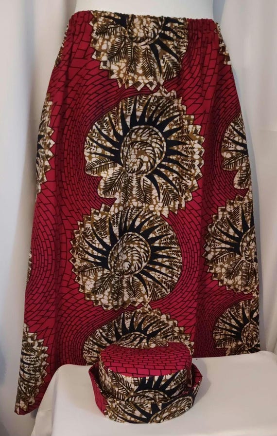 2pc Africa Print Skirt and matching bucket hat. Straight ankle length, and elastic waist skirt with pockets. Free Shipping, 20 % OFF.