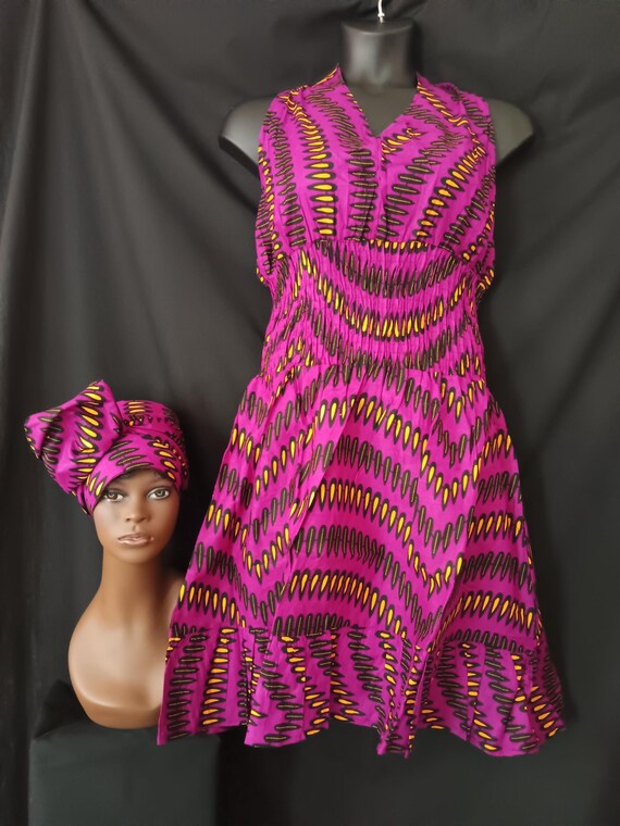 Africa print Sleeveless Halter top dress. Tie back neck, wide elastic waist, pockets, mid length dress with headwrap. 20% OFF. FREE shipping