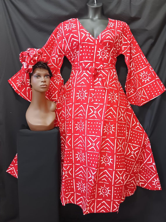 African print wrap dress with matching headwrap. Tie waist, Ankle length, long flowing sleeves. Lovely garment. 20% off. Free Shipping.