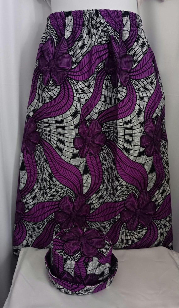 2pc Africa Print Skirt and matching bucket hat. Straight ankle length, elastic waist skirt with pockets. Free Shipping, 20 % OFF