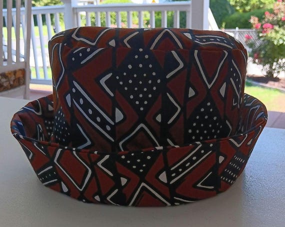 Africa inspired fabric Bucket hat, cotton fabric fully lined. Unisex. Fabric print colors Brown, black and white. 20%OFF and FREE Shipping.