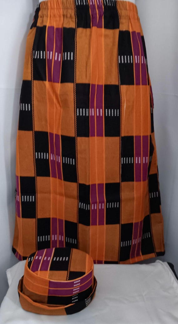 2pc Africa Print Skirt and matching bucket hat. Straight ankle length, elastic waist skirt with pockets. Free Shipping, 20 % OFF.