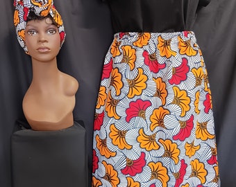 African Print Skirt, matching headwrap, elastic waist with pockets, ankle length. Red, black, orange, yellow,  100% Cotton. Free Shipping.