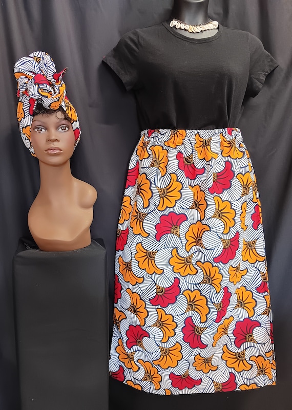 African Print Skirt, matching headwrap, elastic waist with pockets, ankle length. Red, black, orange, yellow,  100% Cotton. Free Shipping.