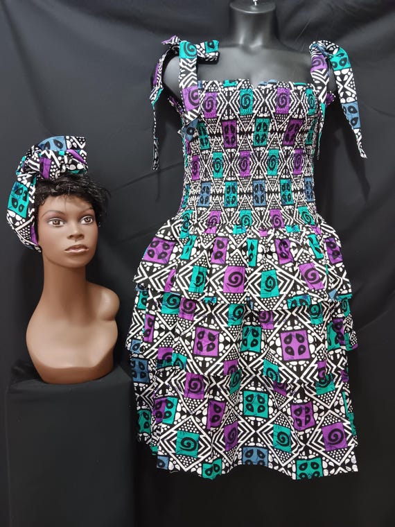 Africa print sun dress with headwrap. Elastic top to waist, tie straps shoulders. Three ruffles waist to bottom. 20% OFF. FREE Shipping.
