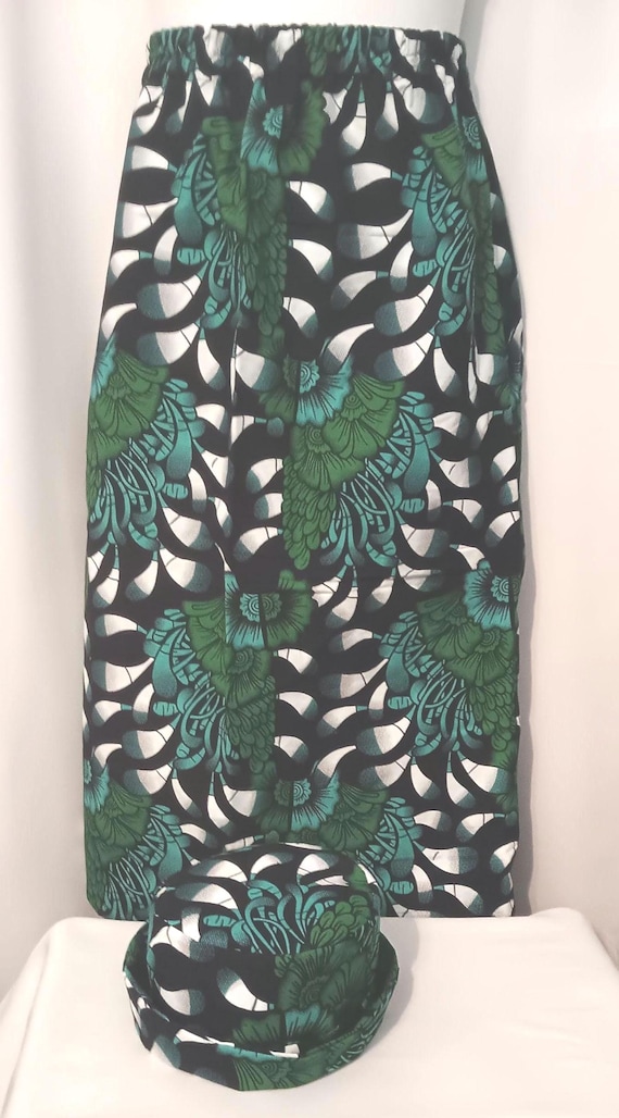 2pc Africa Print Skirt and matching bucket hat. Straight ankle length, and elastic waist skirt with pockets. Free Shipping, 20 % OFF.