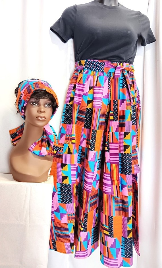 African women's Palazzo Pants, multicolor oranges, gold, blues, purples African print with, tie waist belt, pockets. Fun to wear!!!!