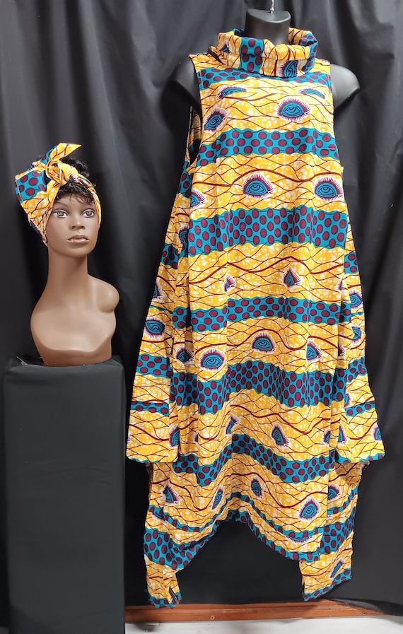 Africa print cowl neck jumpsuit with headwrap. Sleeveless. zip off cowl neck, pockets, 2 zipper crouch easy access. A Cutey. Free Shipping