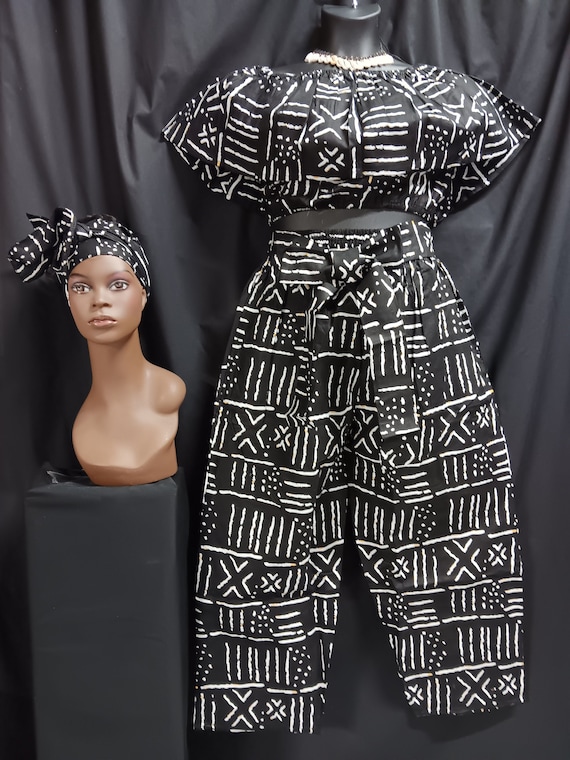 Africa print Women's 3-piece crop top pants set matching headwrap. Sleeveless over shoulder collar elastic waist. Tie belt pants, pockets.