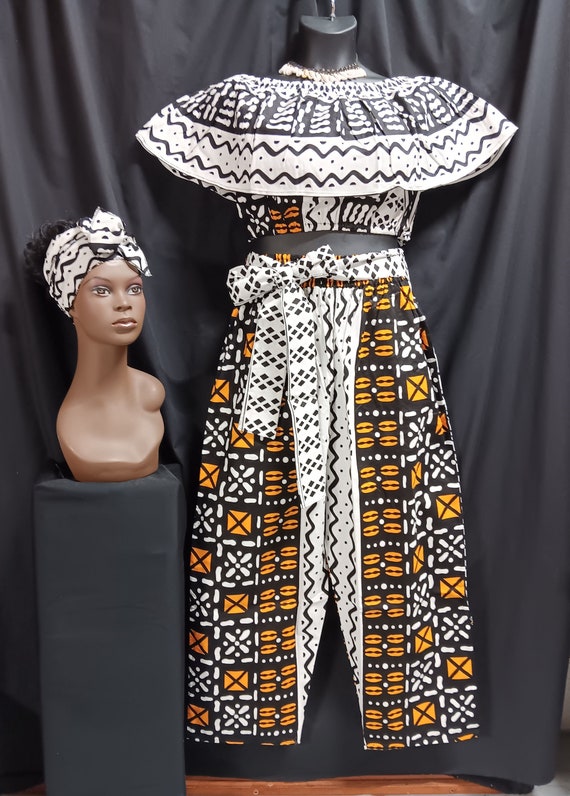 Africa print Women's 3-piece crop top pants set matching headwrap. Sleeveless over shoulder collar elastic waist. Tie belt pants, pockets.