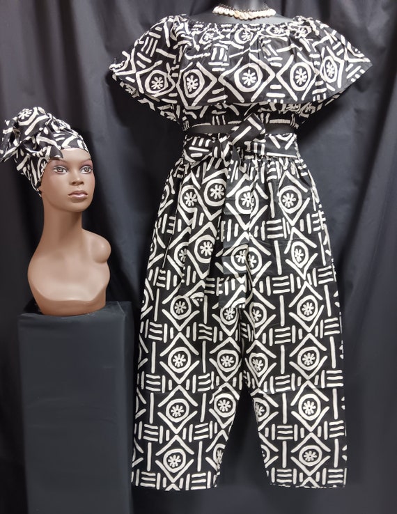Africa print Women's 3-piece crop top pants set matching headwrap. Sleeveless over shoulder collar elastic waist. Tie belt pants, pockets.