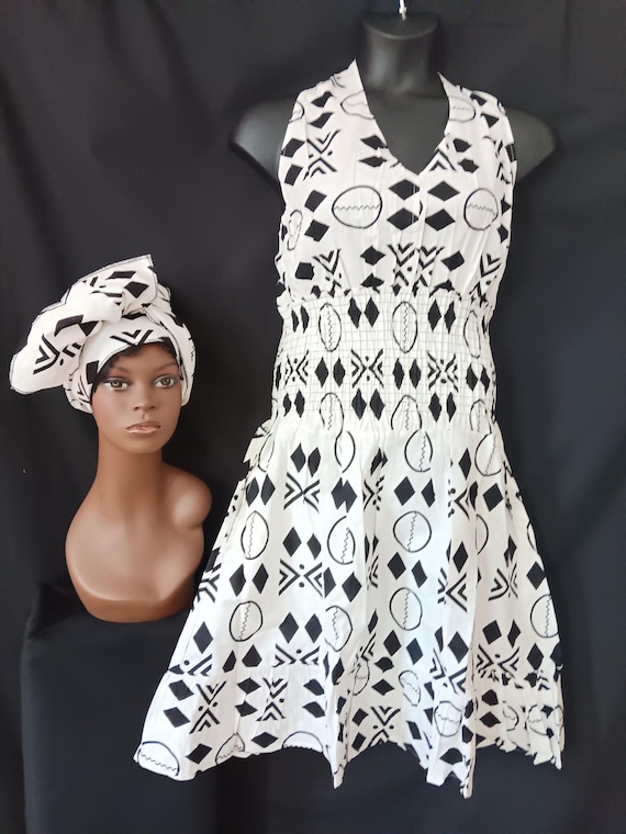 Africa print Sleeveless Halter top dress. Tie back neck, wide elastic waist, pockets, mid length dress with headwrap. 20% OFF. FREE shipping