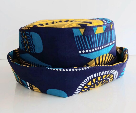 Africa inspired fabric Bucket hat, cotton fabric fully lined. Unisex. Colors are blue, yellow and black fabric. 20%OFF and FREE Shipping