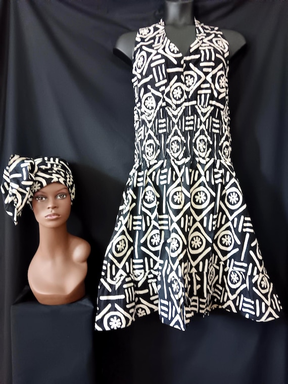 Africa print Sleeveless Halter top dress. Tie back neck, wide elastic waist, pockets, mid length dress with headwrap. 20% OFF. FREE shipping